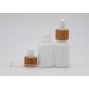Buy cheap White Glass Porcelain Aromatherapy Bottles 30ml With Bamboo White Dropper from wholesalers