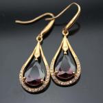 White Gold Plated 925 Silver 7x9mm Oval Amethyst Cubic Zirconia Earrings