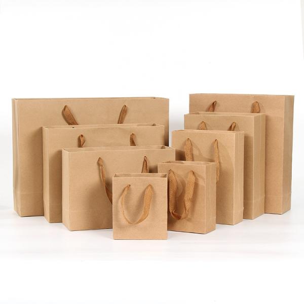 Buy cheap Antiwear Moistureproof Kraft Paper Gift Bags With Handles Multipurpose from wholesalers