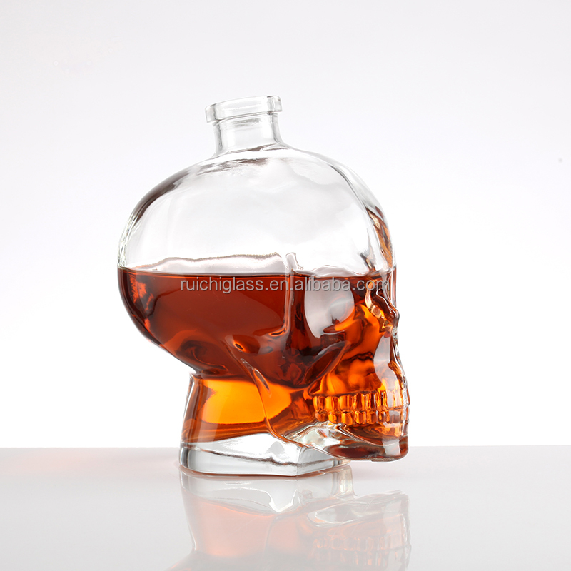 Newest Industrial 500ml Super Flint Glass Skull Vodka Bottle with Sealed Aluminium Cap