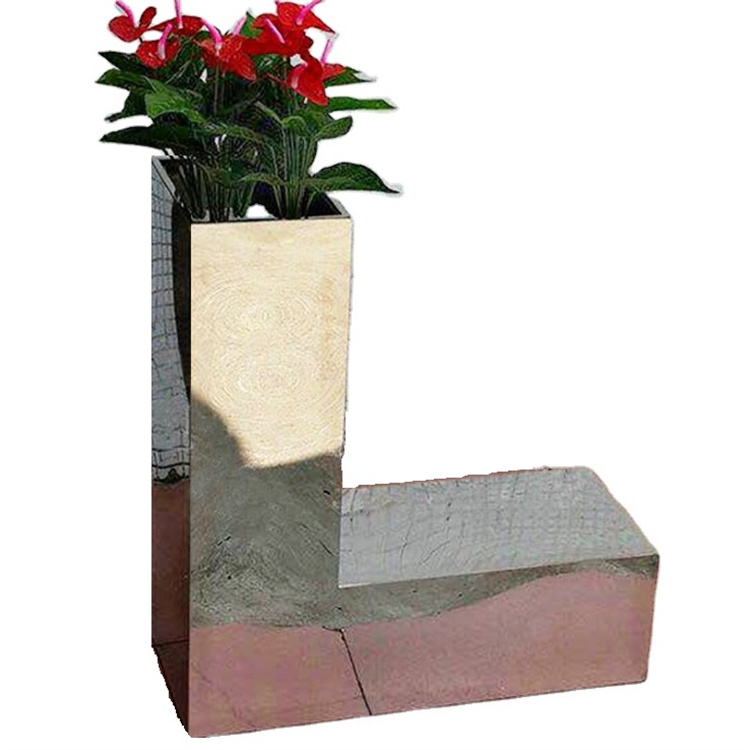 Silver flower pots on the balkon letters metal planters