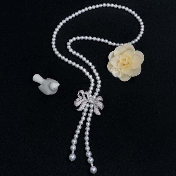 Buy cheap Women White 8mm Shell Pearl Starnds Tassel Necklace with Cubic Zirconia Bow Charm (SN702141) from wholesalers