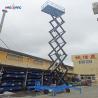 Buy cheap 300kg-1500kg Mobile Scissor Lift Platform With Solid Tires And AC DC Power from wholesalers