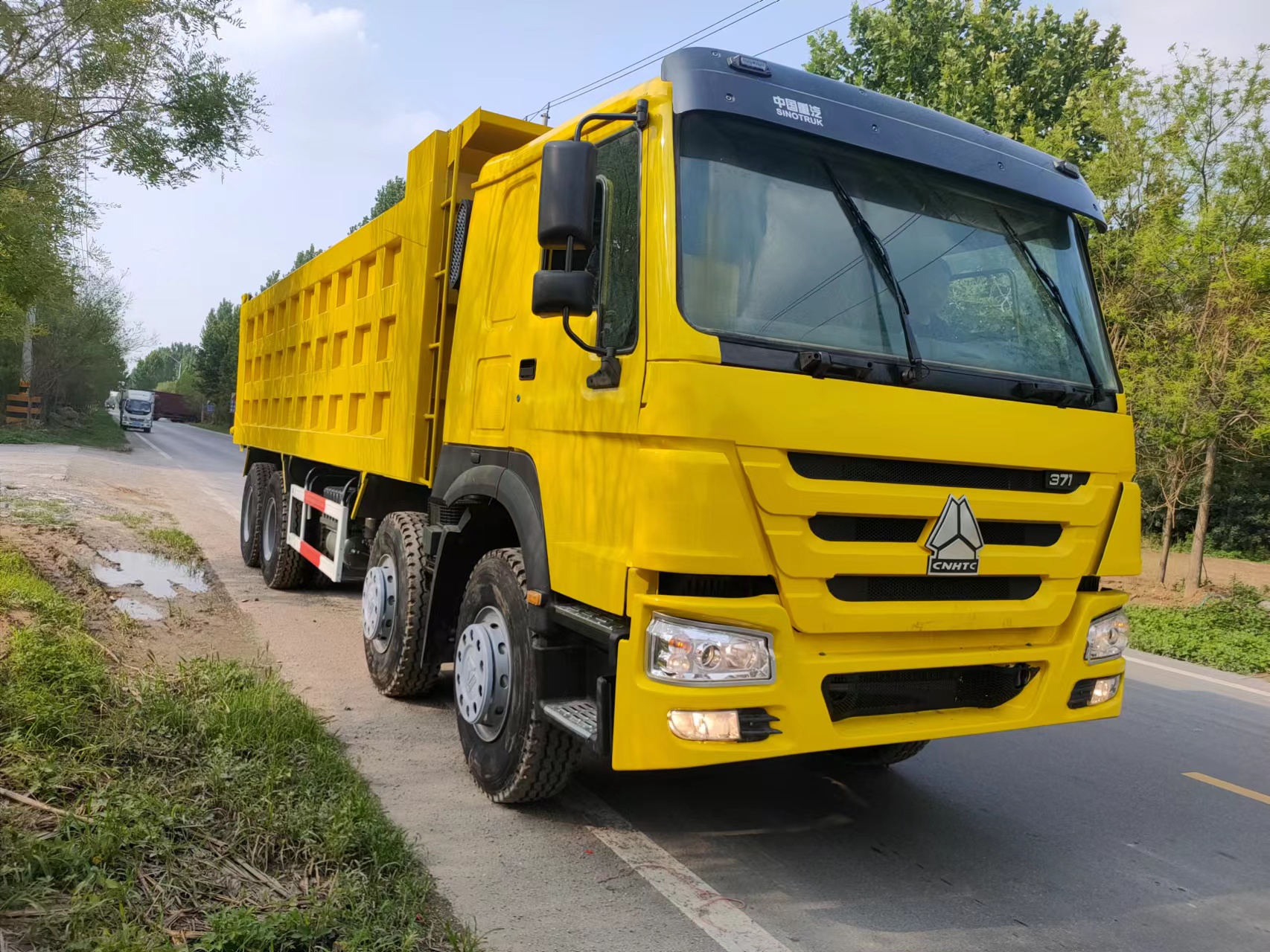 Sinotruk Howo 8x4 371hp 450hp 24 Cubic Meter Used Dump Tipper Truck with None ABS