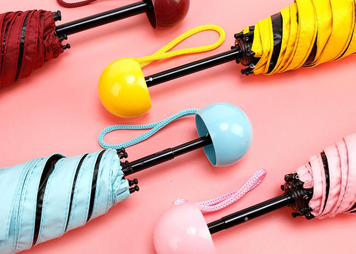 Capsule black plastic umbrella ultra light mini pocket sun umbrella for advertising gift