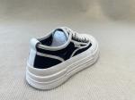 Women black and white sneakers with breathable mesh and mid top