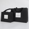 Buy cheap OEM Black White Apparel Paper Bag Clothing Marble Paper Gift Bags from wholesalers