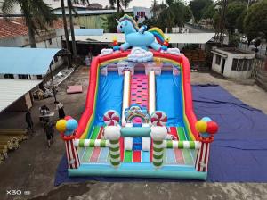Wholesale Rainbow Horse Two Parallel Channels Inflatable Slides With Candy Shaped Pillars from china suppliers