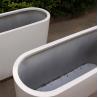 Buy cheap Large metal white flower pots artificial curved planter boxes from wholesalers
