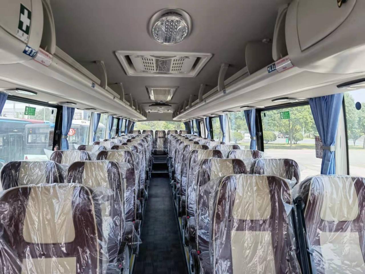 65 1 1 Seat Capacity Diesel Engine Tourist Coach Bus for Africa Design and 600L Fuel Tank