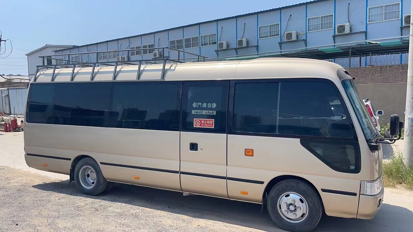 Affordable 30-Seat Diesel Bus Luxury Coaster Bus with 18000kg G.V.W