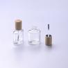 Buy cheap empty nail glass polish bottle 15ml with brush/ bamboo wood cap make up from wholesalers