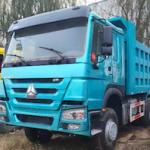 used dump truck HOWO tractor truck SINOTRK 371HP red yellow
