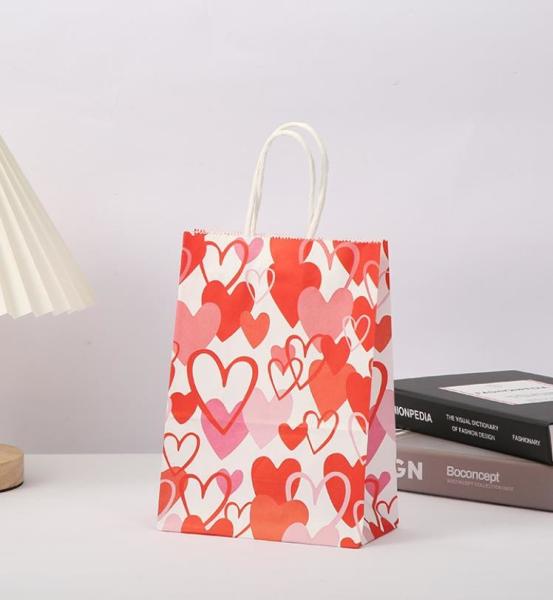 Buy cheap Red 80gsm Kraft Paper Gift Bags Love Heart Printed Paper Goodie Bags With Handles from wholesalers