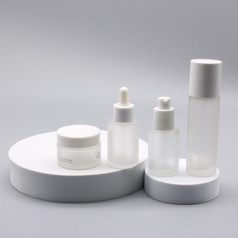 Frosted Skin Care Serum Toner Plastic Lotion Bottles Round Pump Glass Bottles 50ml