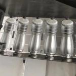 Design 4 Cavity Semi Automatic PET Bottle Blowing Machine for Max. Bottle Height