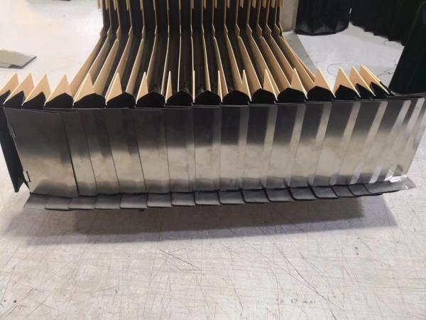 Buy cheap highly durability laminar bellow / hinged steel lamellas black and silver for agaist sharp edged swarf from wholesalers