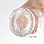 ODM 500ml 700ml 750ml Round Liquor Glass Bottle With T Sealing Cork