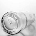Customized Super Flint Round Clear Glass Bottle for Gin Rum Vodka Whisky 580ml