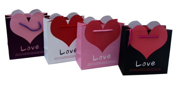 Buy cheap Love heart shape paper carrier bags with matt coat 230gsm artpaper 2 color printing from wholesalers