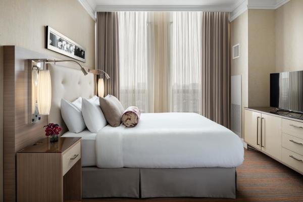Buy cheap laminated Oak wood Hotel bedroom Furniture sets Tall headboard with Fabric upholstered padded and TV units Contemporary from wholesalers