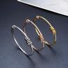 Buy cheap unique niche brand coil rhinestone inlaid bracelets 18k gold snap button bangles from wholesalers