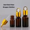 Buy cheap Customized Accepted Essential Oil Small Round Empty Shiny Silver Gold Dropper Oil Bottle with Unique Flower Basket Rubber from wholesalers