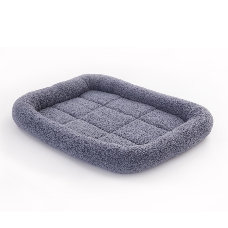 grey fluffy dog bed
