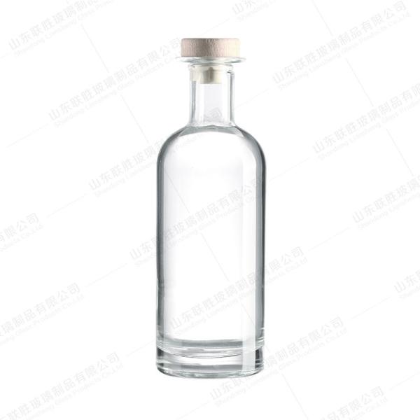 Buy cheap Rubber Stopper Sealing Type Custom Logo Clear Glass Bottle for Whiskey Vodka Rum Gin T Tap from wholesalers