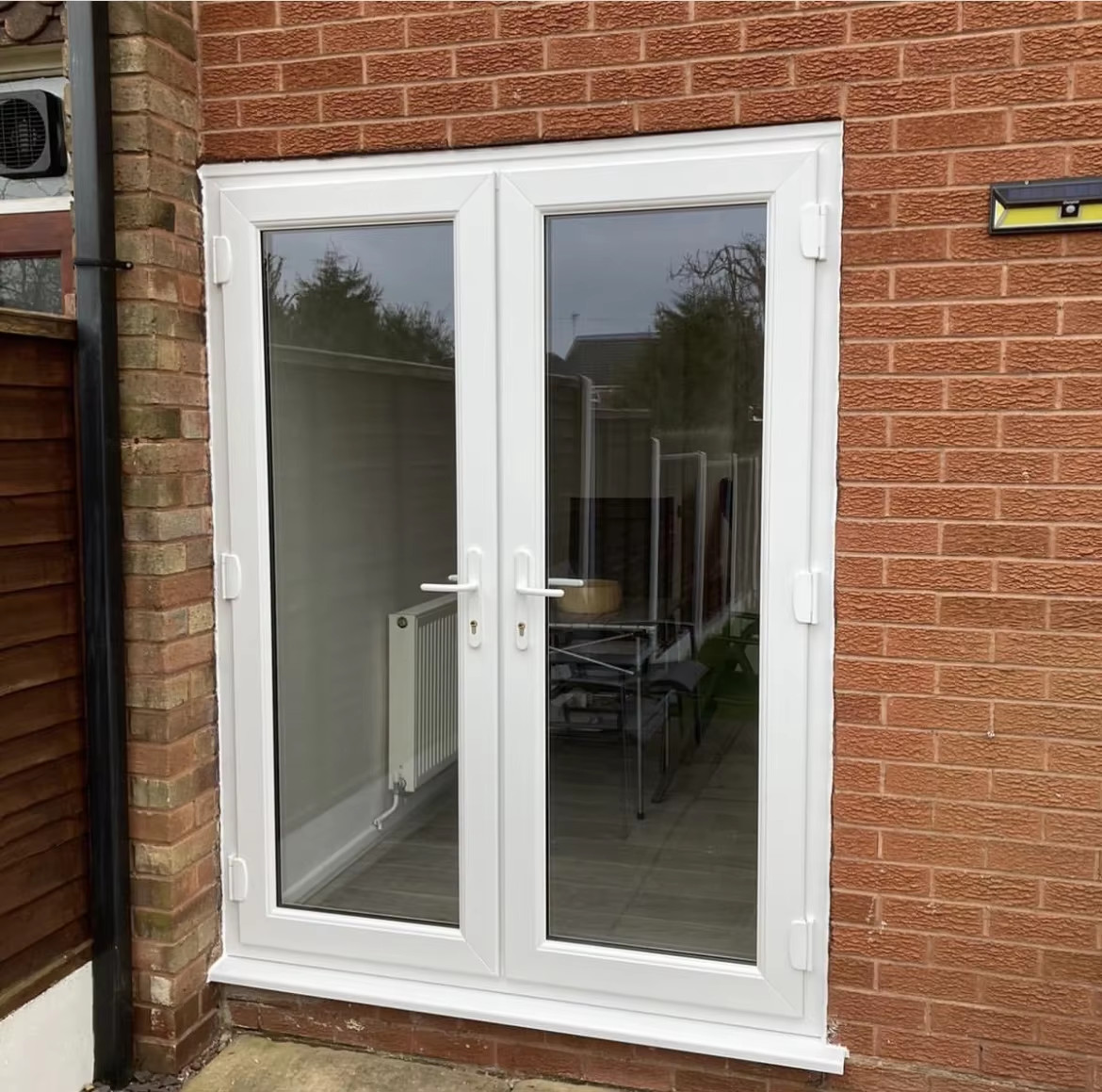 Windproof Double Double Hinged Glass Doors PVC Impact Resistant Glass Door ODM