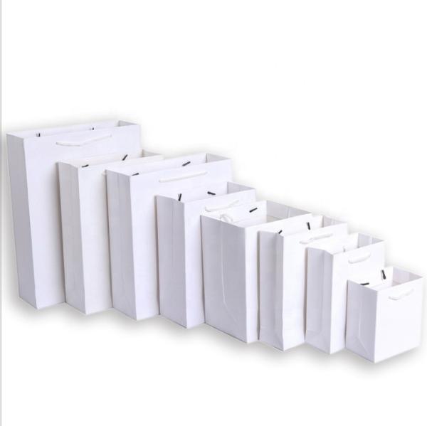 Buy cheap Customized Printing Card Paper Bags With Handles For Clothing Shopping from wholesalers