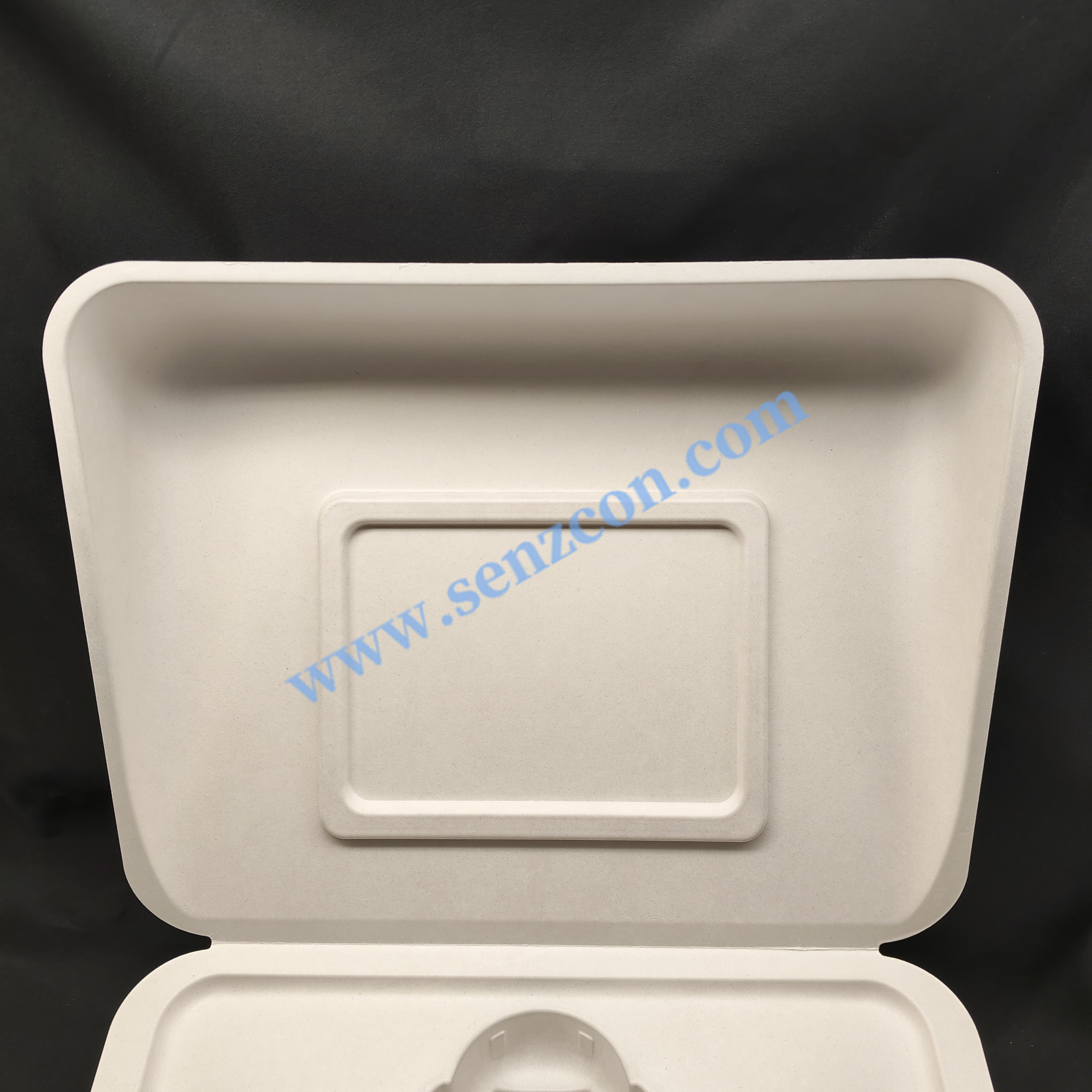 The paper-plastic packaging for high-end beauty instruments is made by combining plant fibers through wet pressing. It features an embedded inner