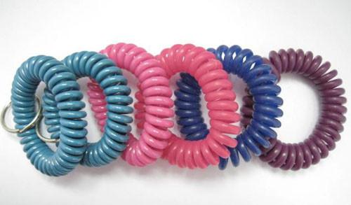 Buy cheap Lake-blue/coffee/pink color soft spring spiral coil elastic wrist band key ring chain hot from wholesalers