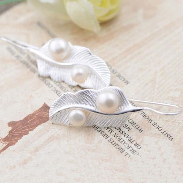 Buy cheap terling Silver Pearl Vintage Feather Dangle Earring (051023W) from wholesalers