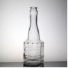 Buy cheap Customized Surface Handing Football Shaped Glass Bottle for Unique Alcohol Beverage from wholesalers