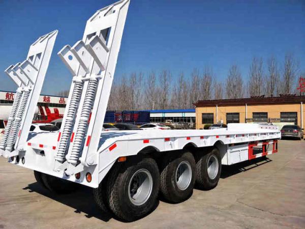 Buy cheap Tri-axle 60 Ton Low Bed Truck Trailer- SINOMICC semi trailer white color for transit machines from wholesalers