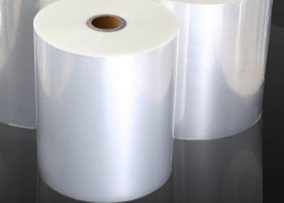 Transparent glossy BOPP laminate sheet with pre-coated adhesive and 20 micron