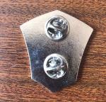 metal logo badge