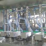 Stainless Steel 304 Multi-Nozzle Olive Oil Filling Machine for Popular Bottling