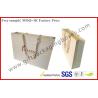 Buy cheap Branded Custom Paper Gift Bags With Ribbon Handles , Embossing Logo Paper Hand Bags from wholesalers