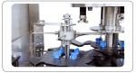1-5L Pesticide Drum Four Head Rotary Capping Machine with France Schneider