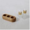 Buy cheap Newest Wood Essential Oil Bottle Display Stand Customized Wood base Solid Wood Oval shape Holder from wholesalers