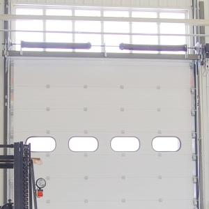 Wholesale Wind Load Max 55m/S Industrial Sectional Doors Surface Embossing Anti Breaking from china suppliers
