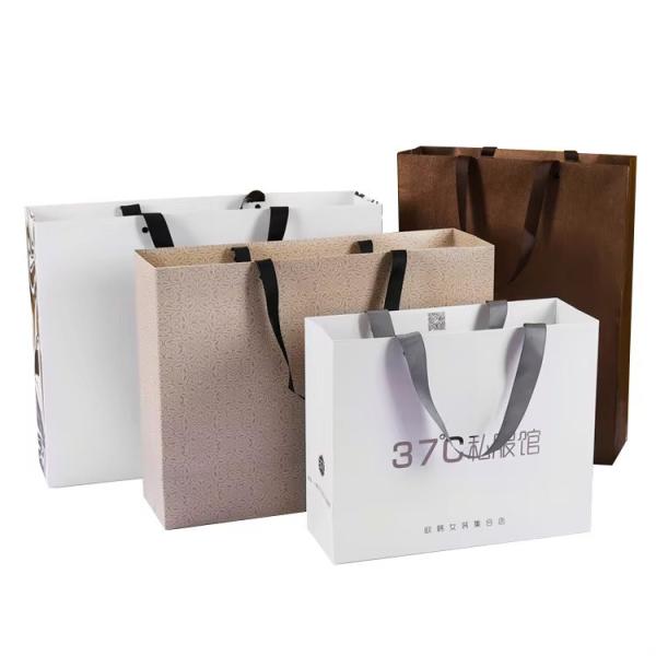 Buy cheap Paper Bag Packaging For Clothes Shoes Custom Logo Printed Luxury Paper Bags from wholesalers