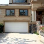 Modern Design And Functionality Electric Garage Doors For Residential Settings
