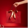 Buy cheap Customized Printed Red Christmas Paper Bags with Ribbon Bow from wholesalers