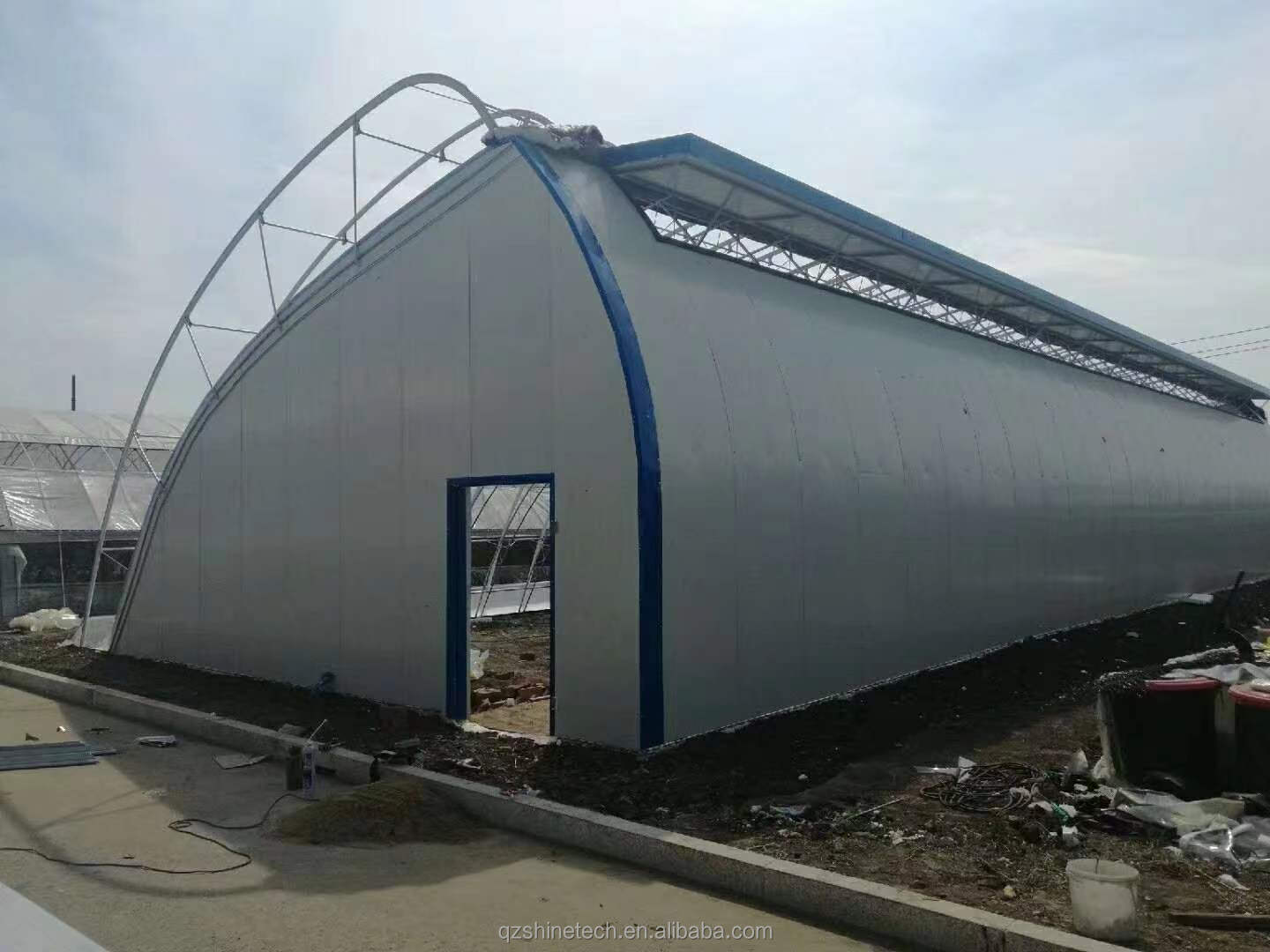 Single Layer Brick Wall Solar Greenhouses 8m-16m Width With Insulation Blanket