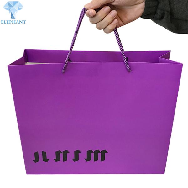 Buy cheap Exhibition Purple Grey Cardboard CCNB Gift Bags With Handles Spot UV from wholesalers