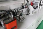 6.3KW Motor PLC Controlled Woodworking PVC Edge Banding Machine for Manufacturin