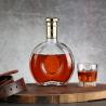 Buy cheap Hot Stamping Sale Round 700ml Brandy Whiskey Glass Bottles with Cork and Tamper Proof from wholesalers